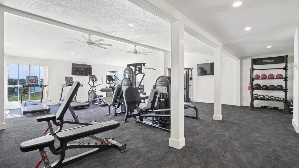 a living room with a large flat screen tv